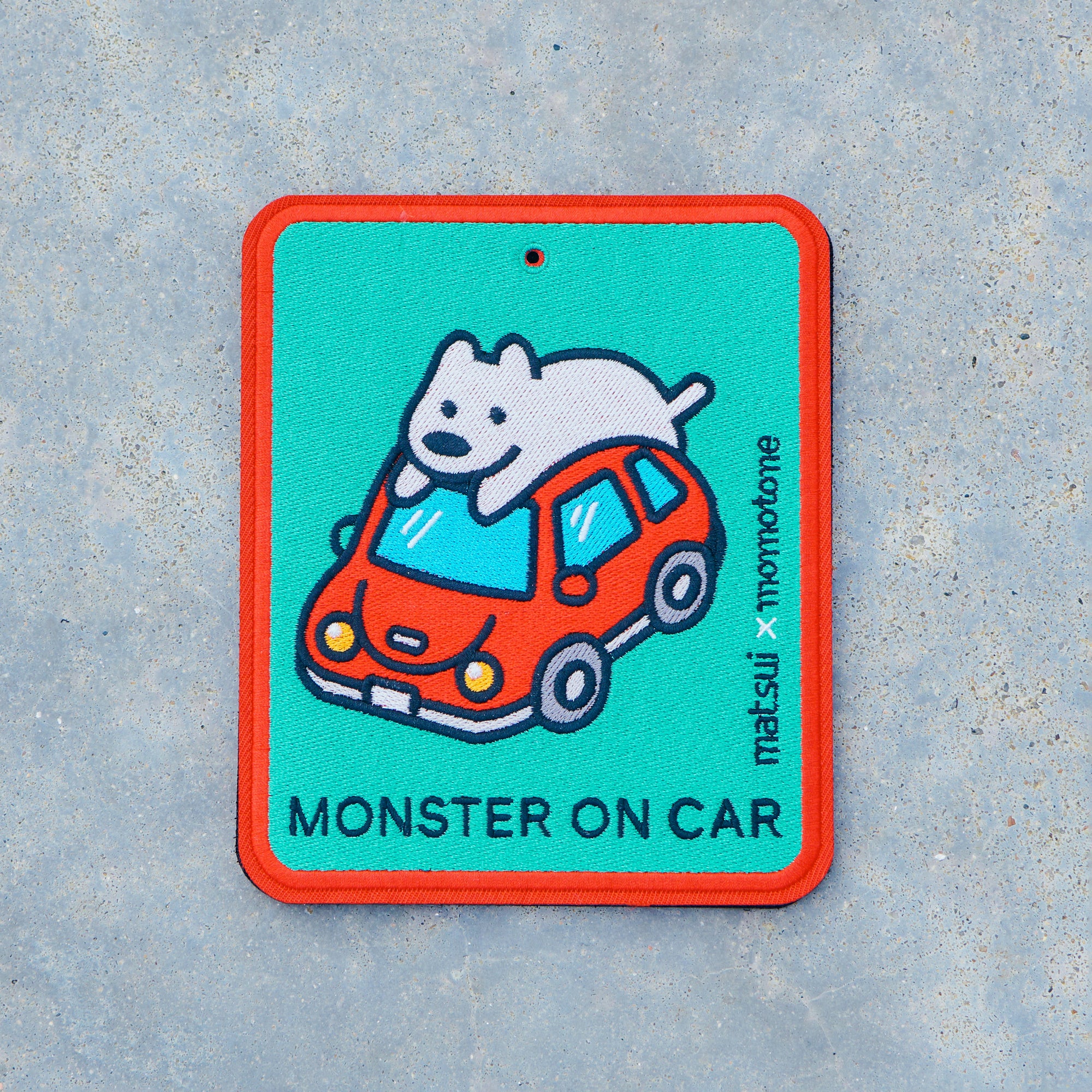 matsui x momotone / monster on car caution badge