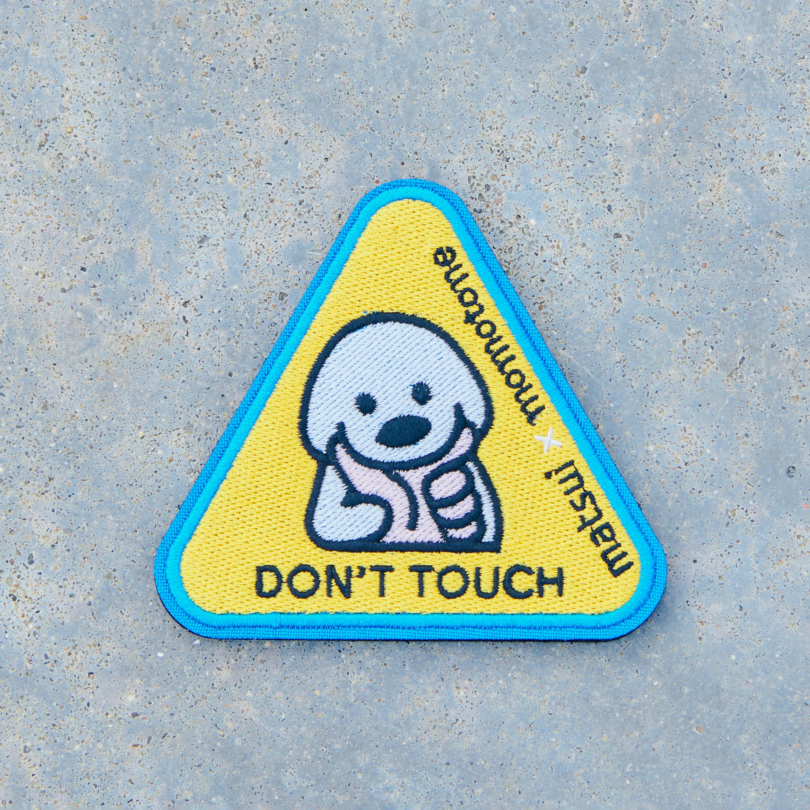 matsui x momotone / don't touch caution badge