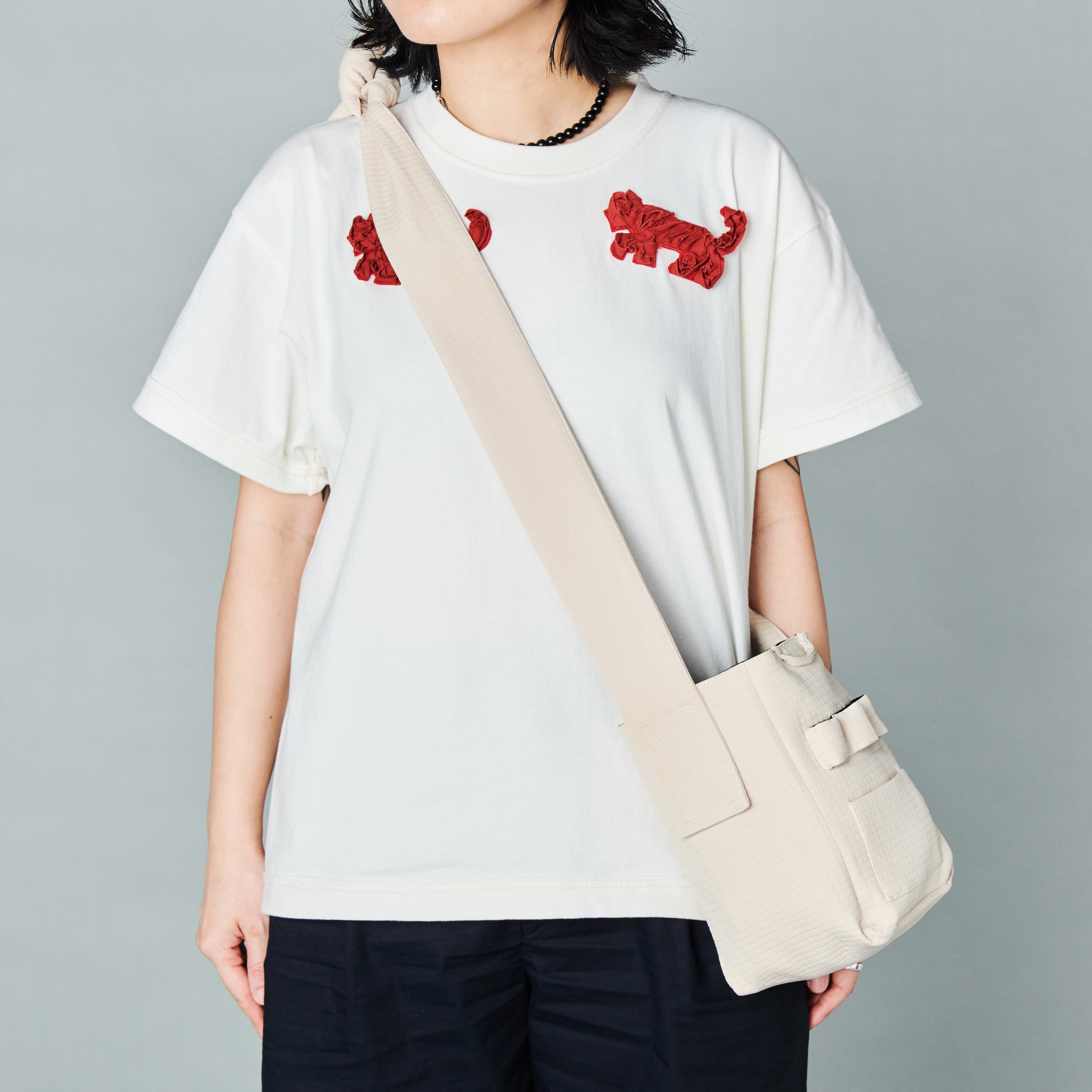 seed / hooman the handler light beige