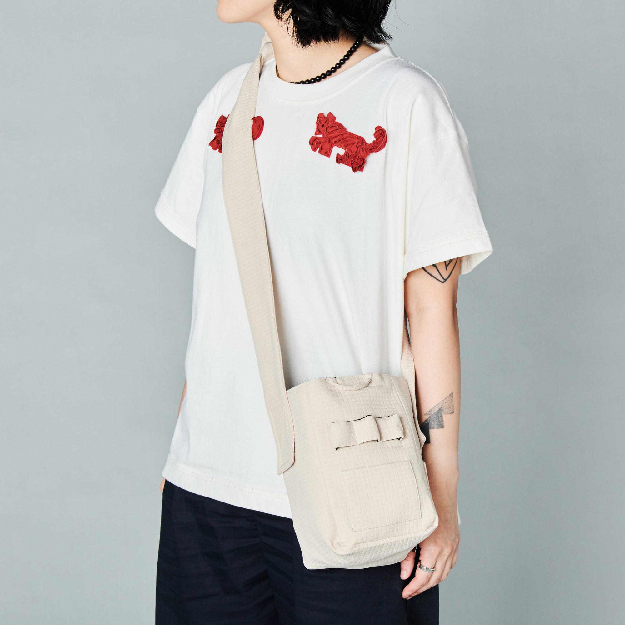 seed / hooman the handler light beige