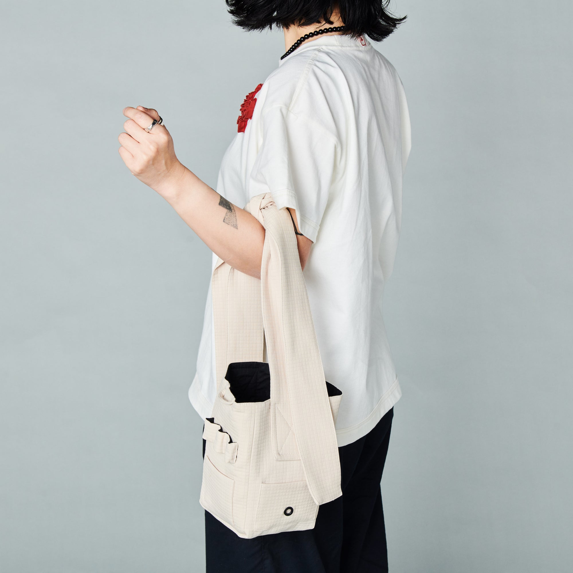 seed / hooman the handler light beige