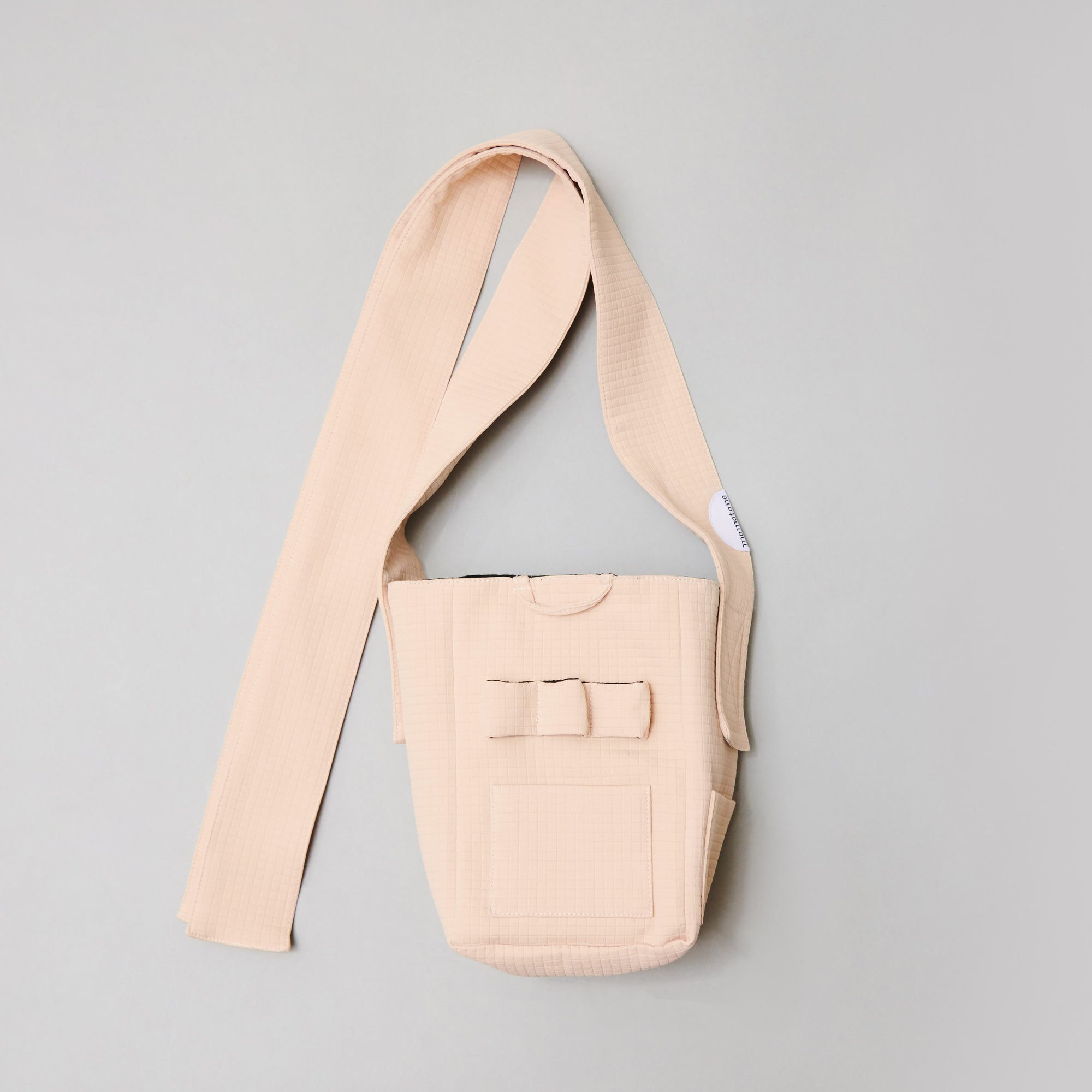 seed / hooman the handler light beige