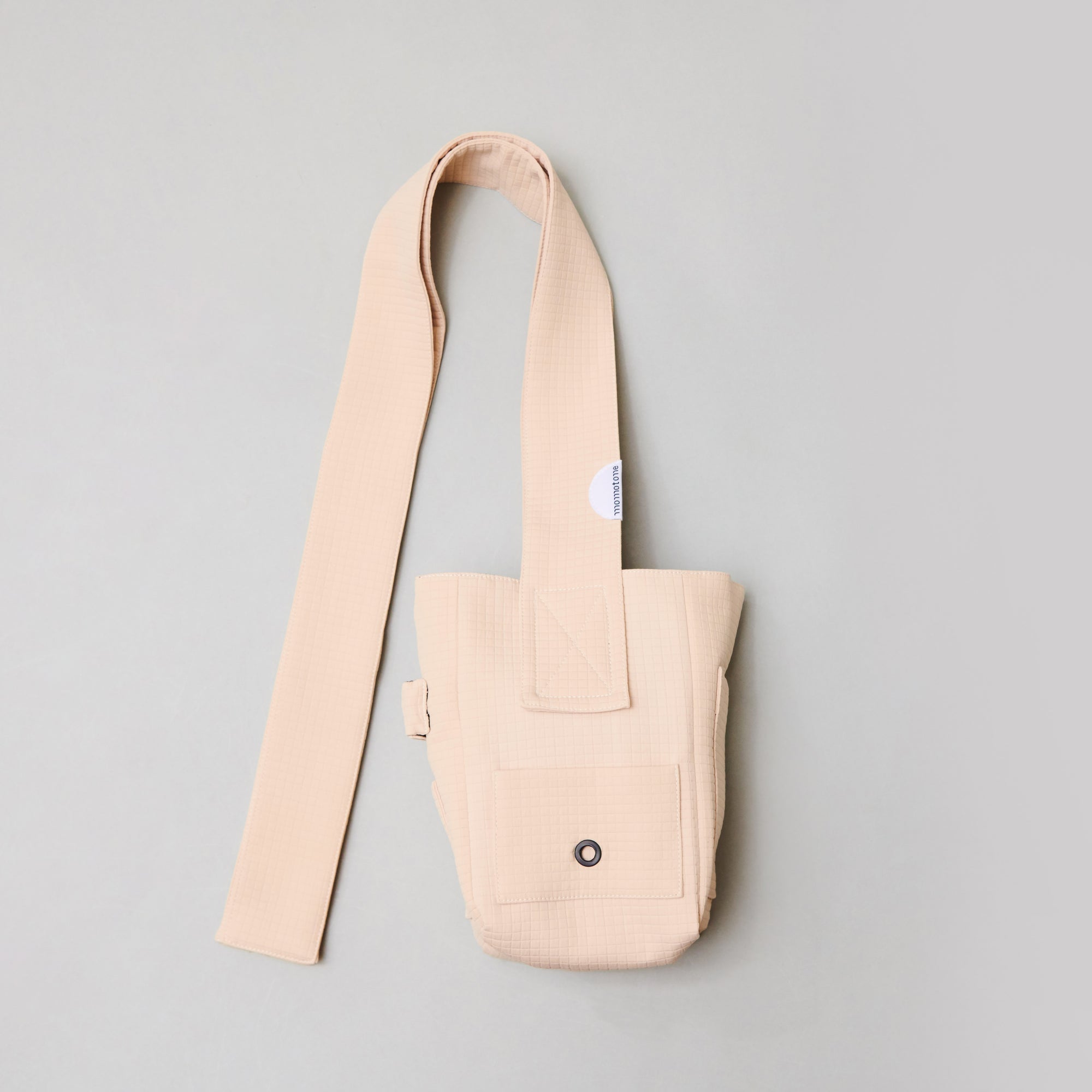 seed / hooman the handler light beige